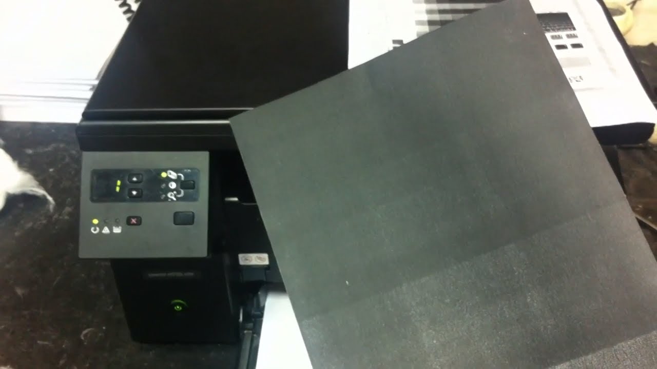 Принтер Konica Minolta печатает черные листы